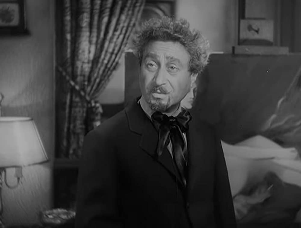 「痴人の愛」ベティ・デイビス & レスリー・ハワードの画像