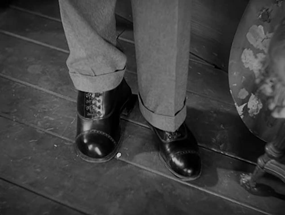 「痴人の愛」ベティ・デイビス & レスリー・ハワードの画像