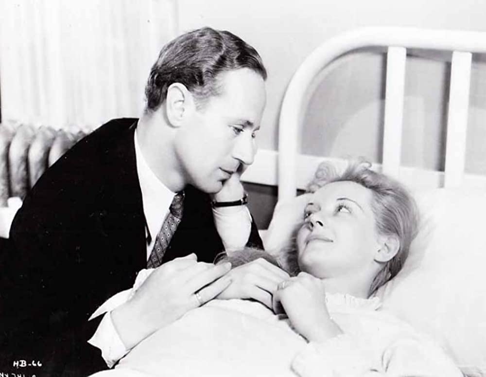 「痴人の愛」ベティ・デイビス & レスリー・ハワードの画像