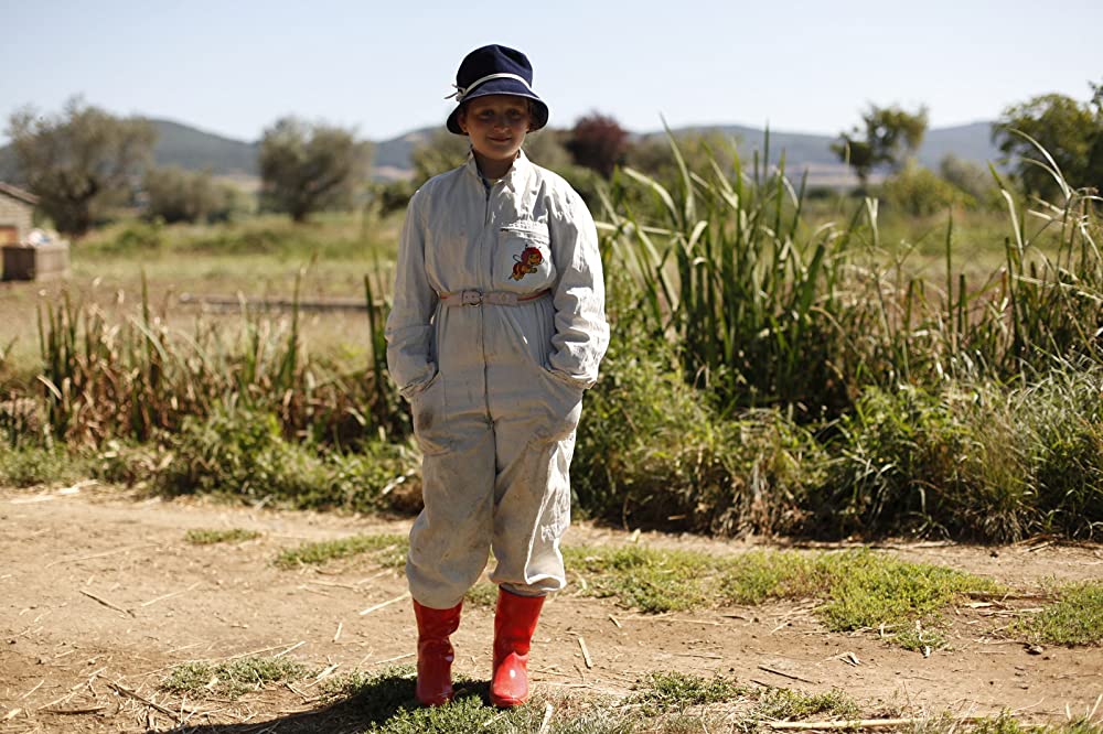 夏をゆく人々の画像