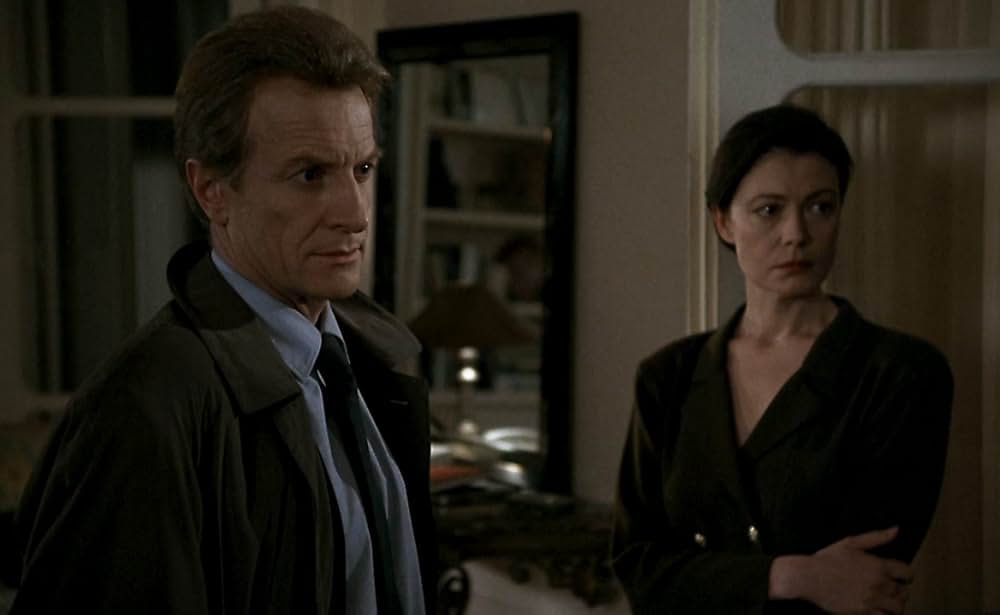 愛を弾く女の画像