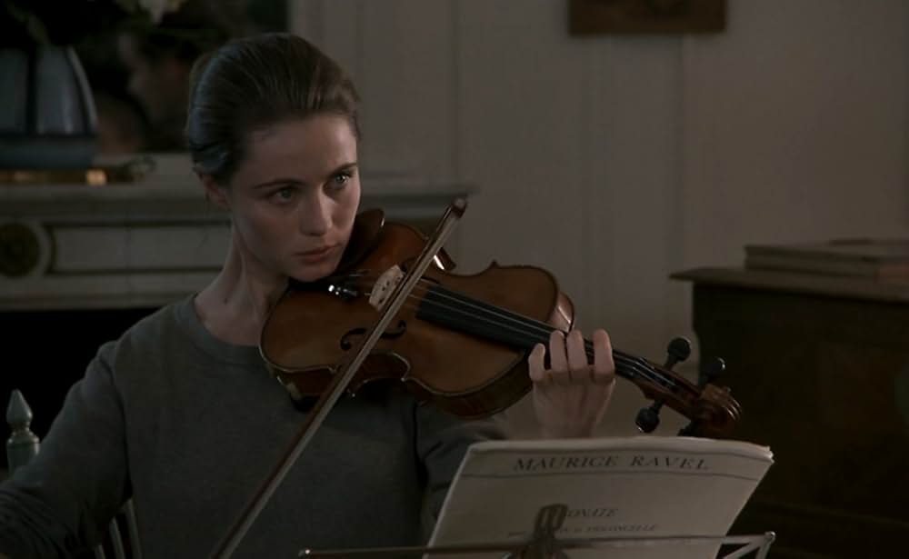 愛を弾く女の画像