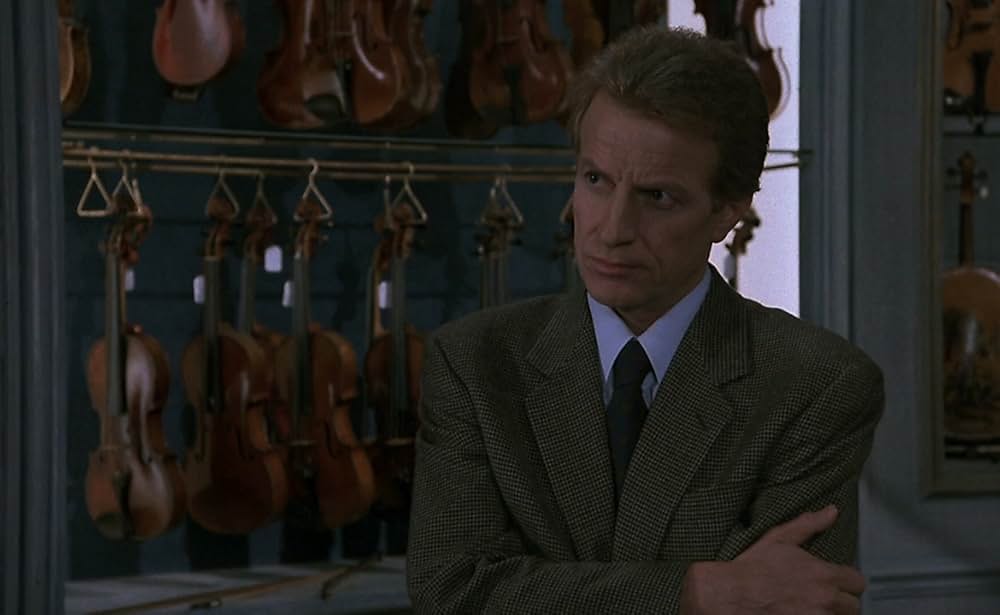 愛を弾く女の画像