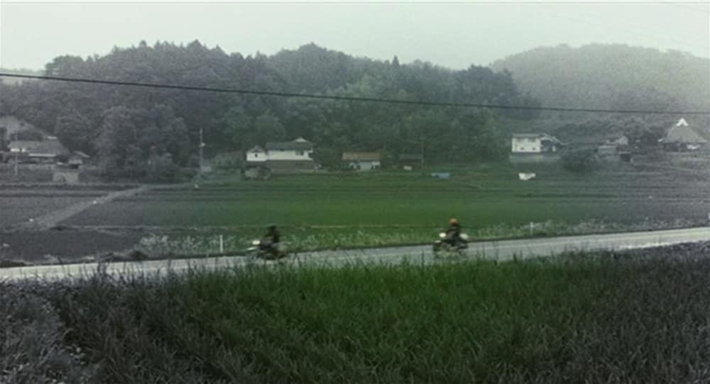 彼のオートバイ、彼女の島の画像