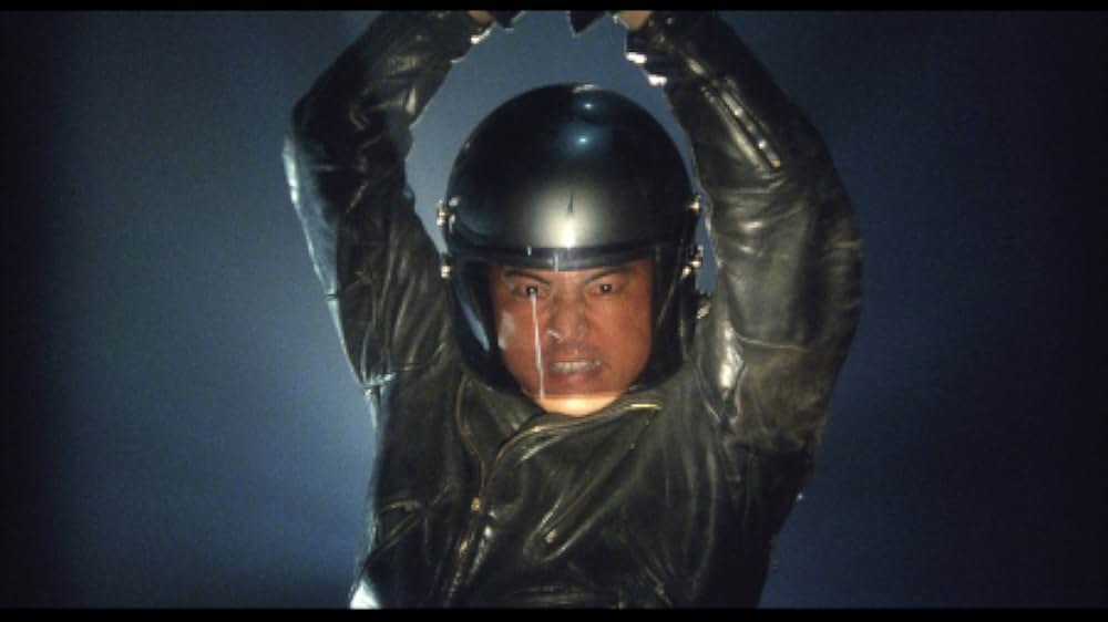 彼のオートバイ、彼女の島の画像