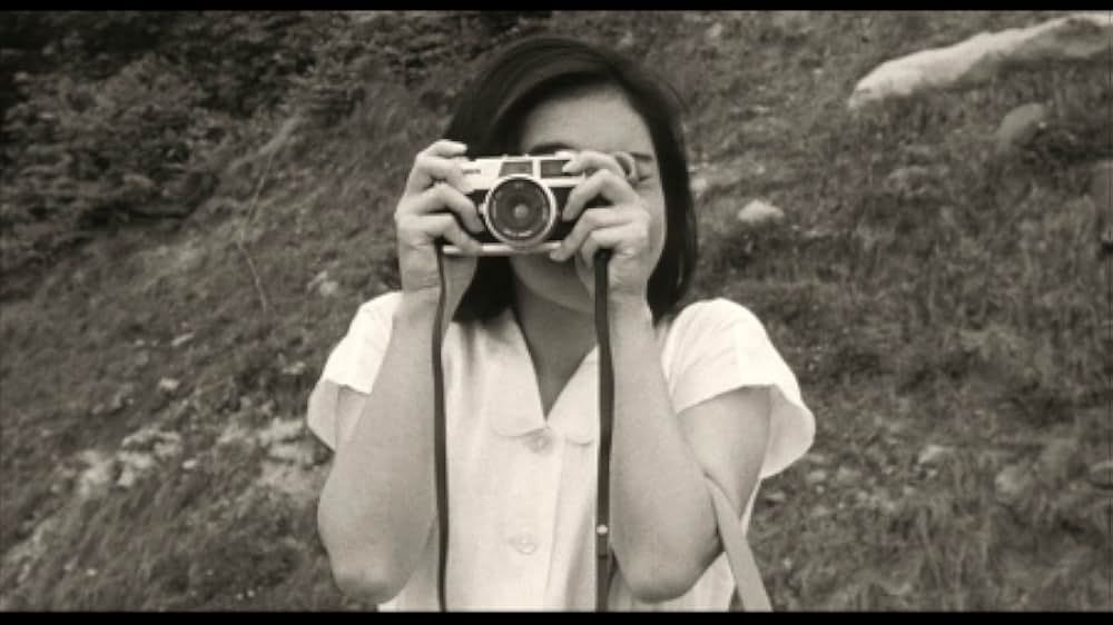 彼のオートバイ、彼女の島の画像