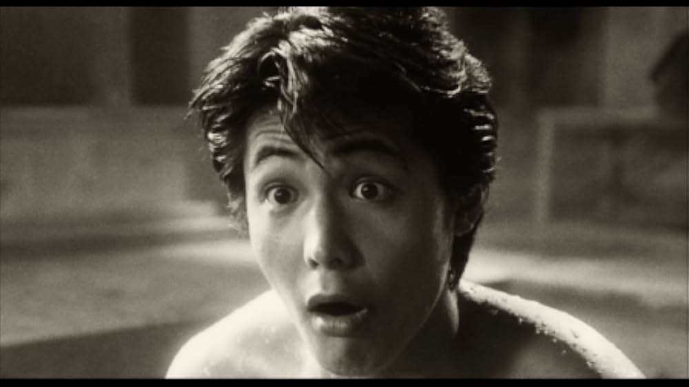 彼のオートバイ、彼女の島の画像