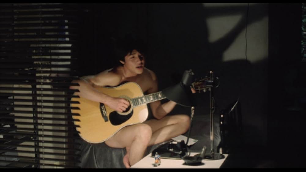 彼のオートバイ、彼女の島の画像