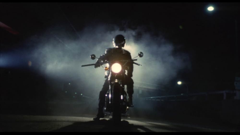 彼のオートバイ、彼女の島の画像