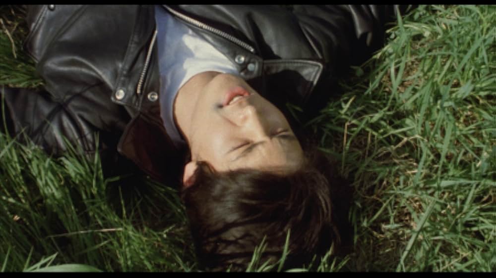 彼のオートバイ、彼女の島の画像