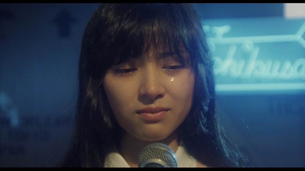 彼のオートバイ、彼女の島の画像