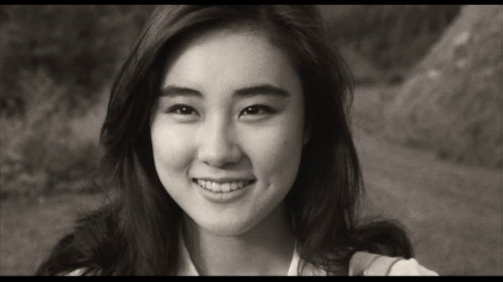 彼のオートバイ、彼女の島の画像