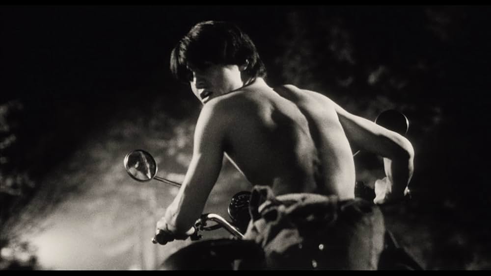 彼のオートバイ、彼女の島の画像