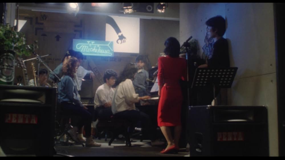 彼のオートバイ、彼女の島の画像