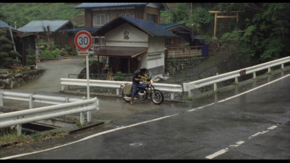 彼のオートバイ、彼女の島の画像