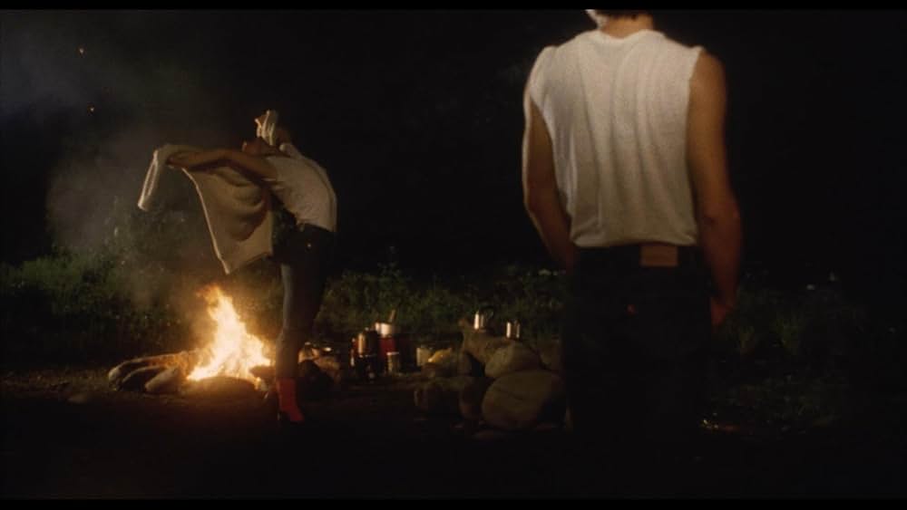 彼のオートバイ、彼女の島の画像