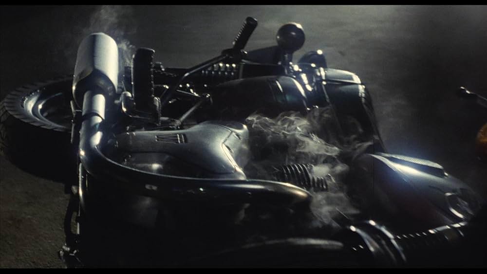 彼のオートバイ、彼女の島の画像