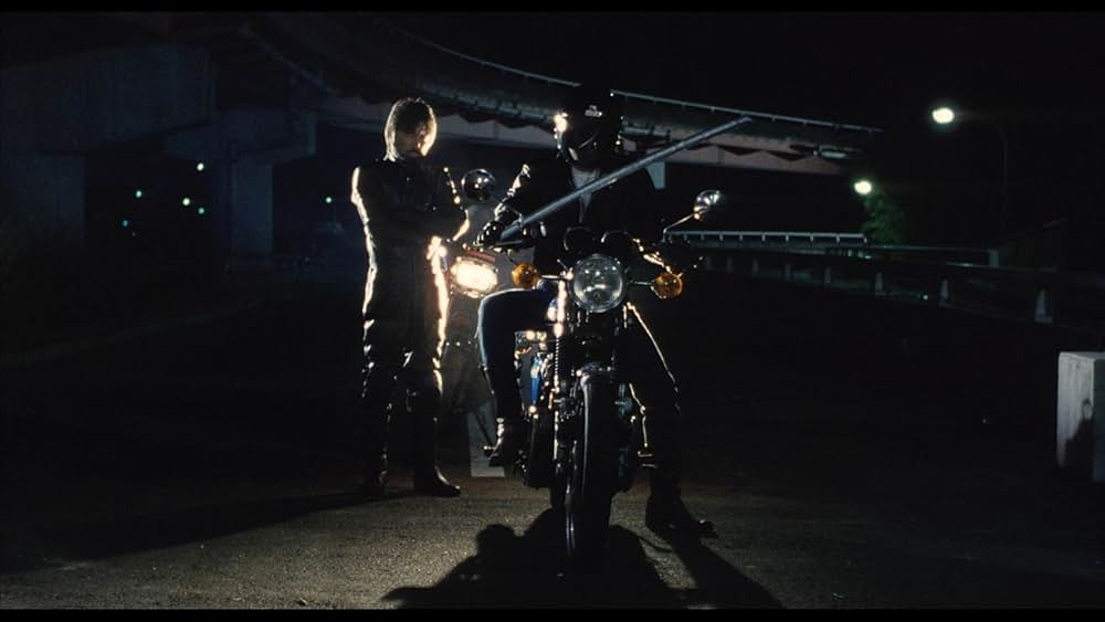 彼のオートバイ、彼女の島の画像