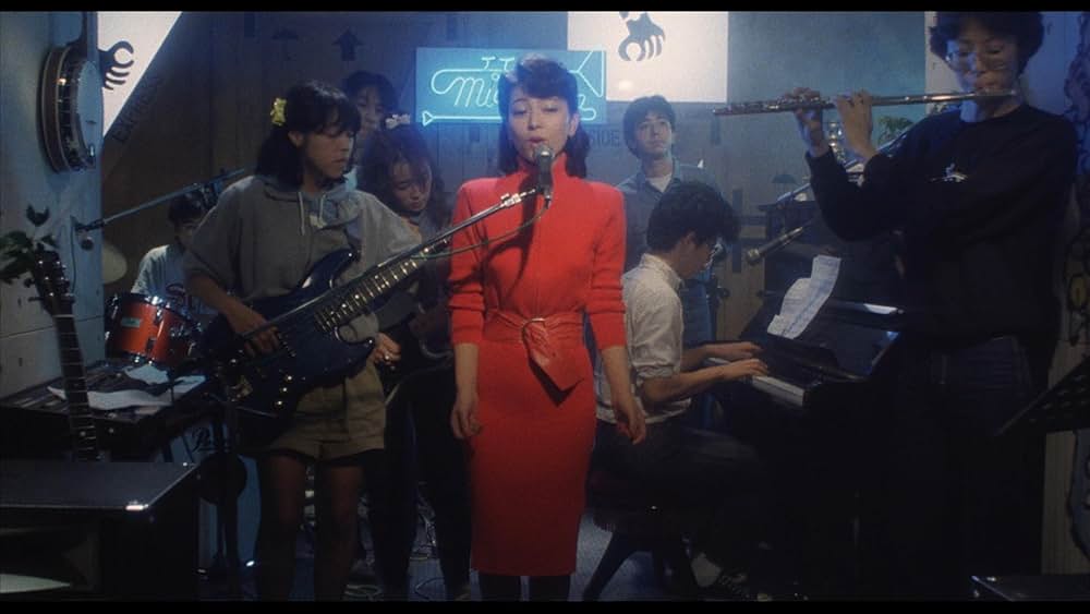 彼のオートバイ、彼女の島の画像