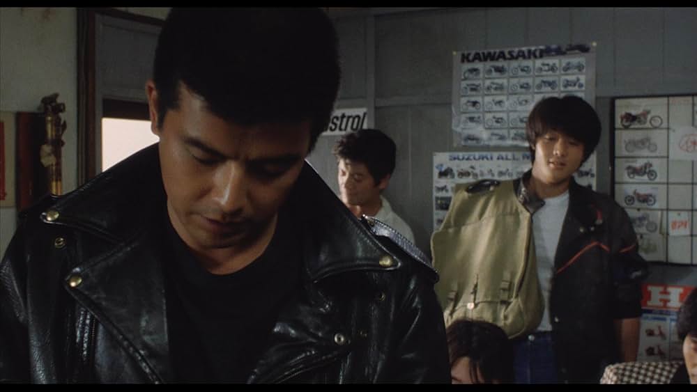 彼のオートバイ、彼女の島の画像