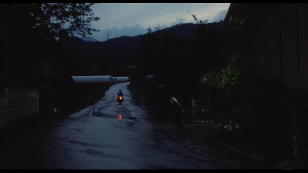 彼のオートバイ、彼女の島の画像