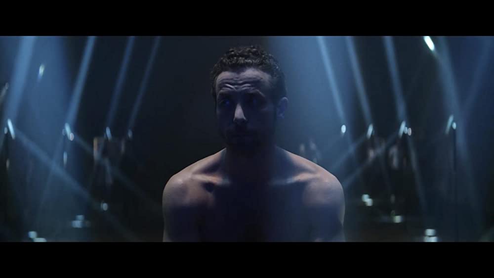 皮膚を売った男の画像