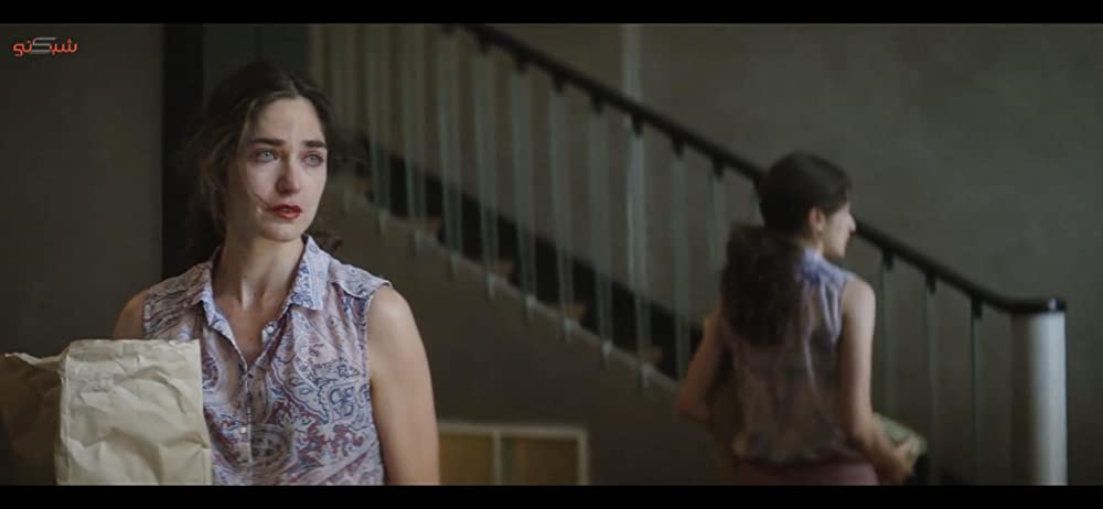 皮膚を売った男の画像