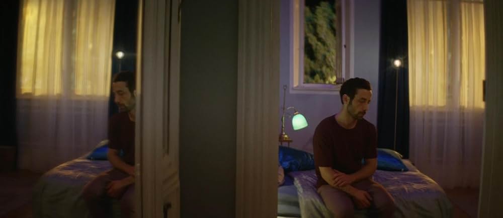 皮膚を売った男の画像