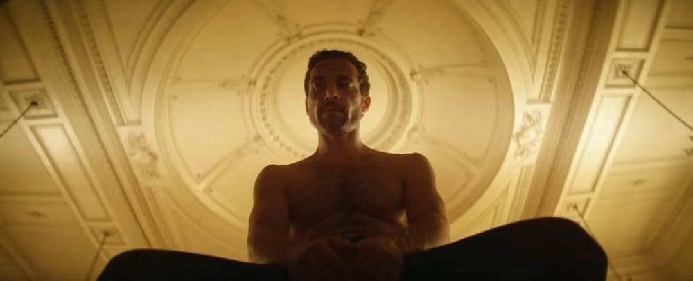 皮膚を売った男の画像