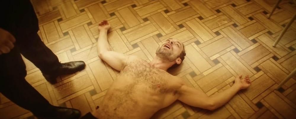 皮膚を売った男の画像