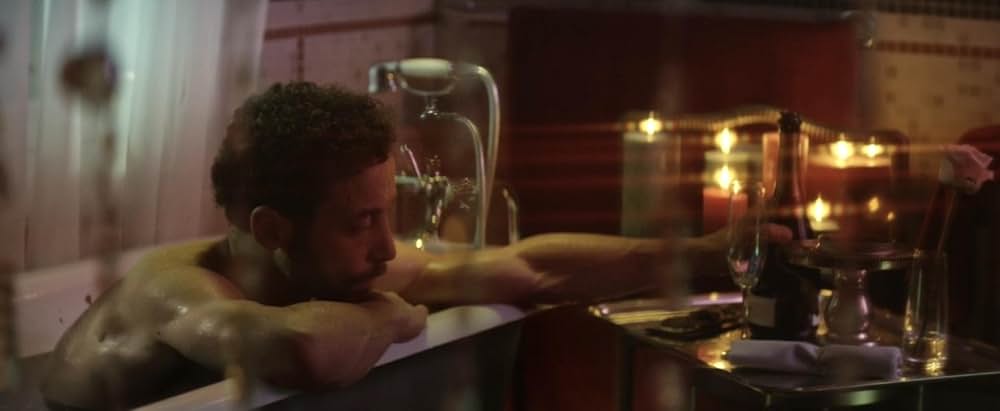 皮膚を売った男の画像