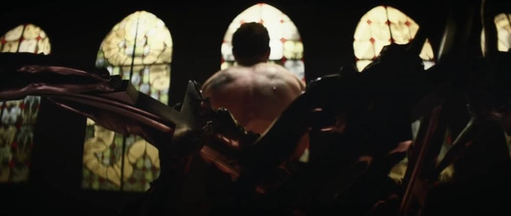 皮膚を売った男の画像