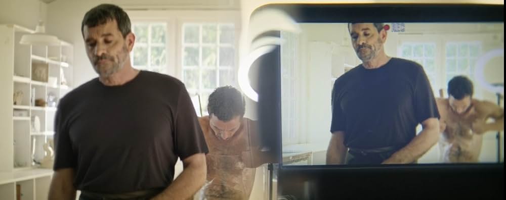 皮膚を売った男の画像