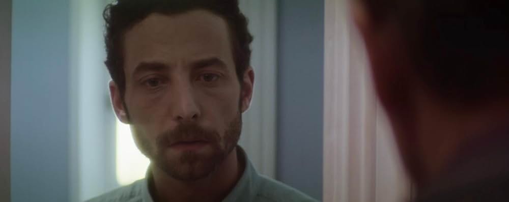 皮膚を売った男の画像