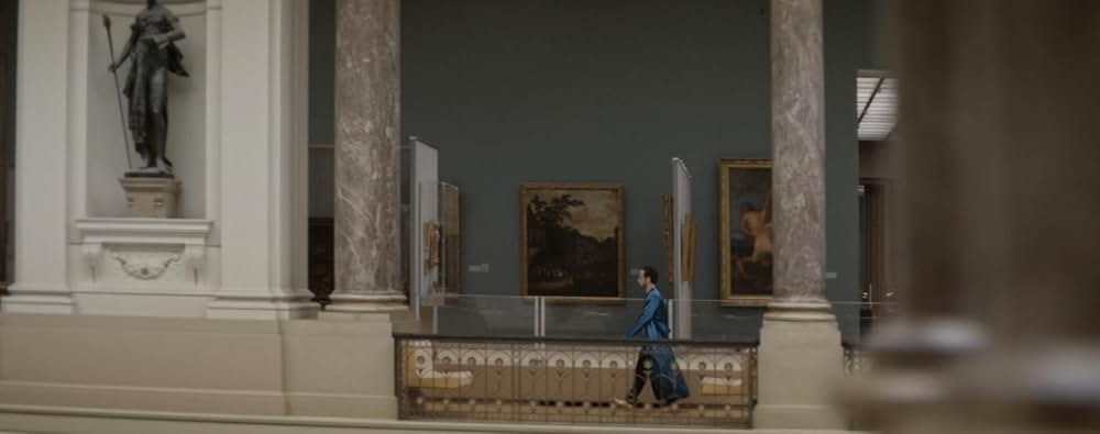 皮膚を売った男の画像