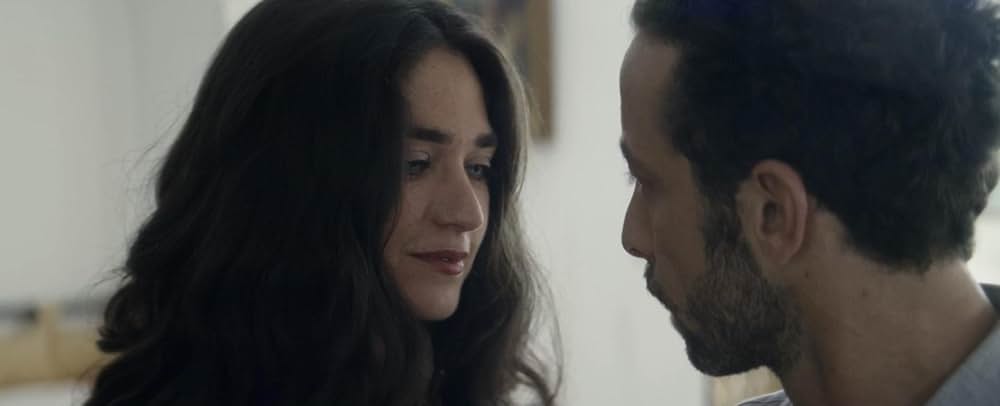 皮膚を売った男の画像