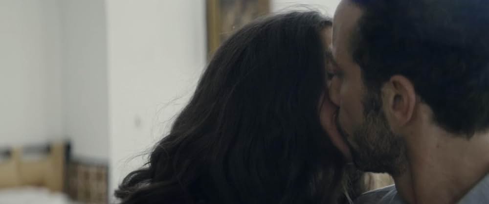 皮膚を売った男の画像