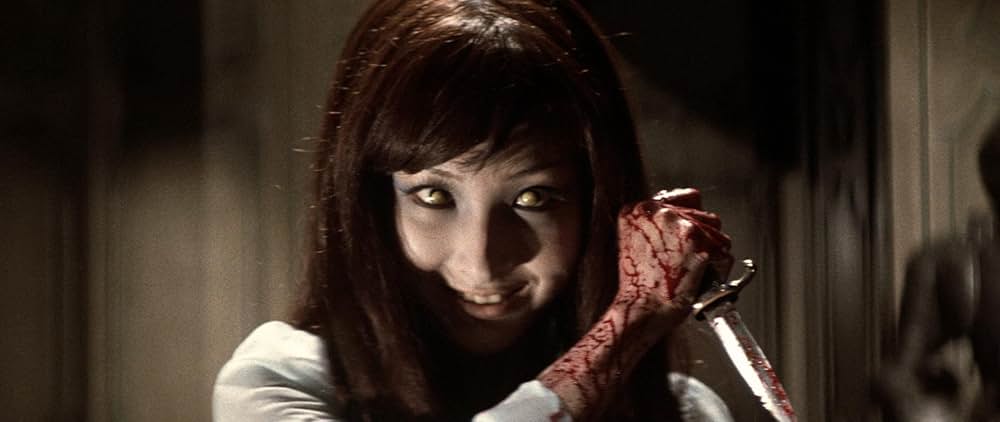 幽霊屋敷の恐怖 血を吸う人形の画像