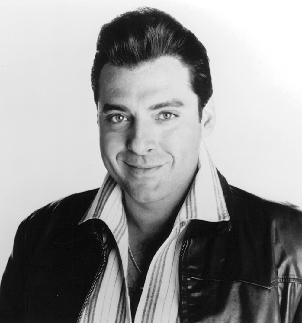 「愛が微笑む時」トム・サイズモアの画像