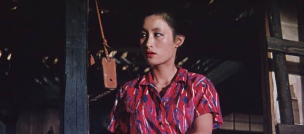 足にさわった女の画像