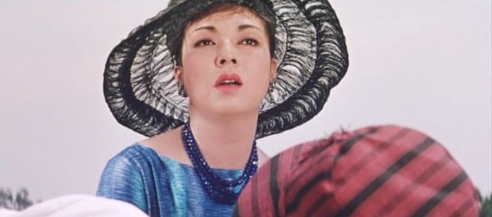 足にさわった女の画像