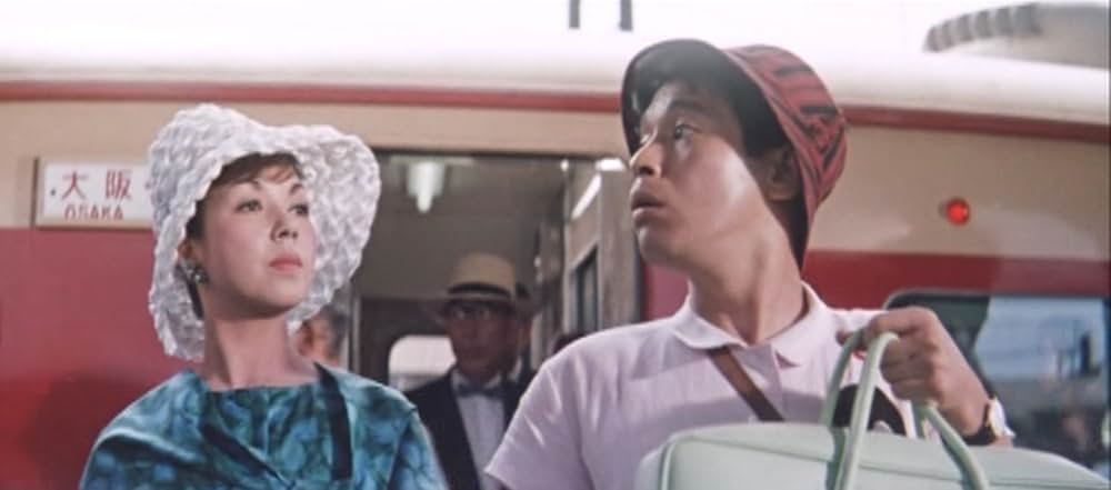 足にさわった女の画像