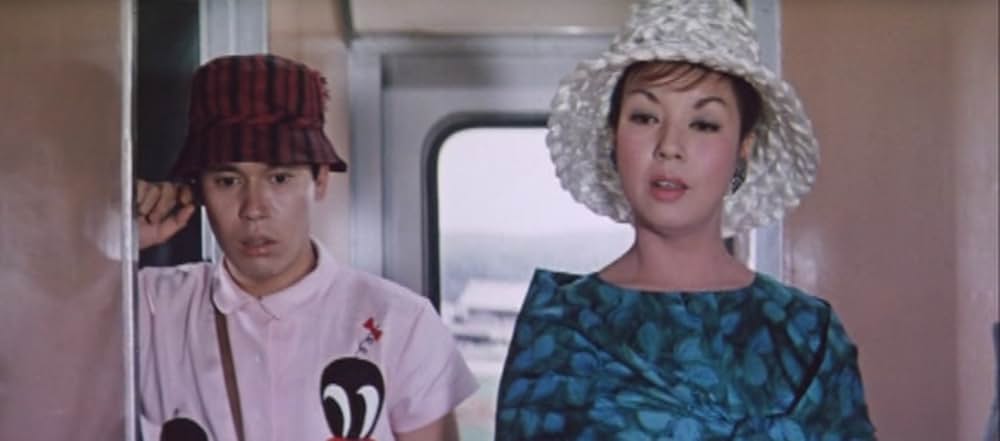 足にさわった女の画像