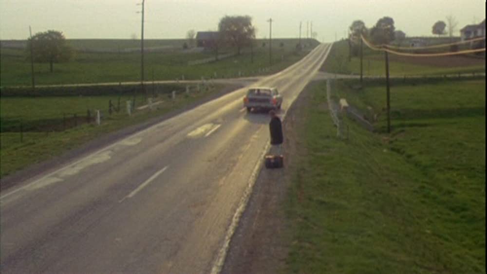 雨のなかの女の画像