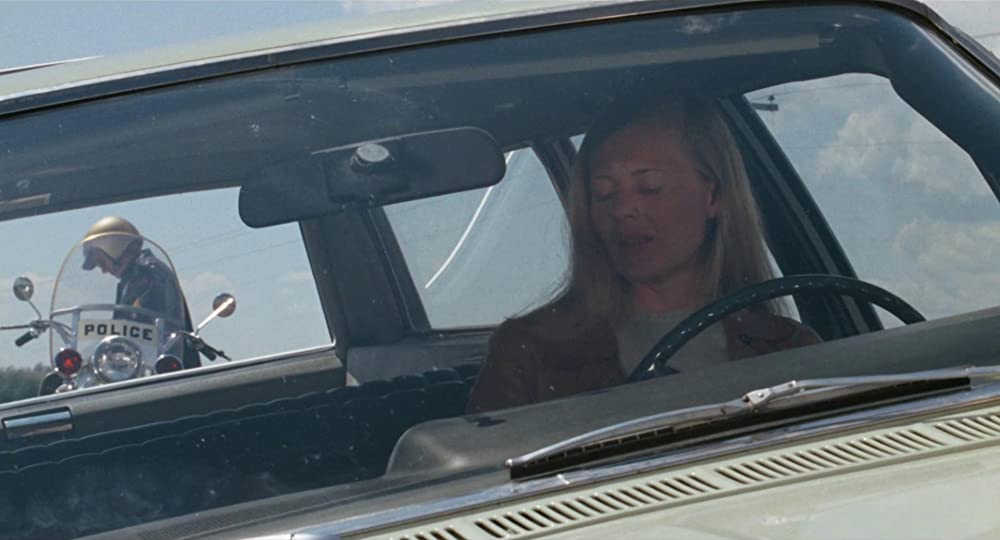 雨のなかの女の画像