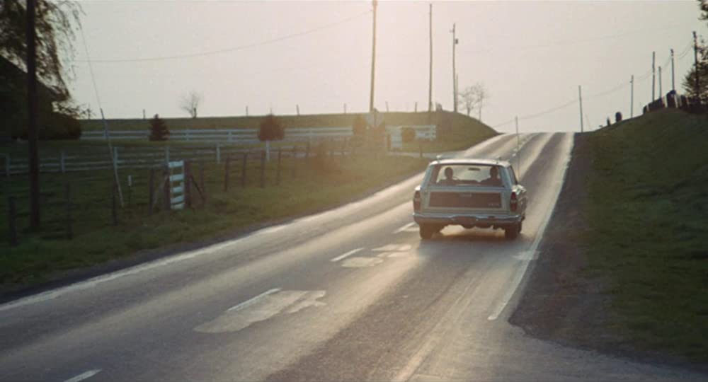 雨のなかの女の画像