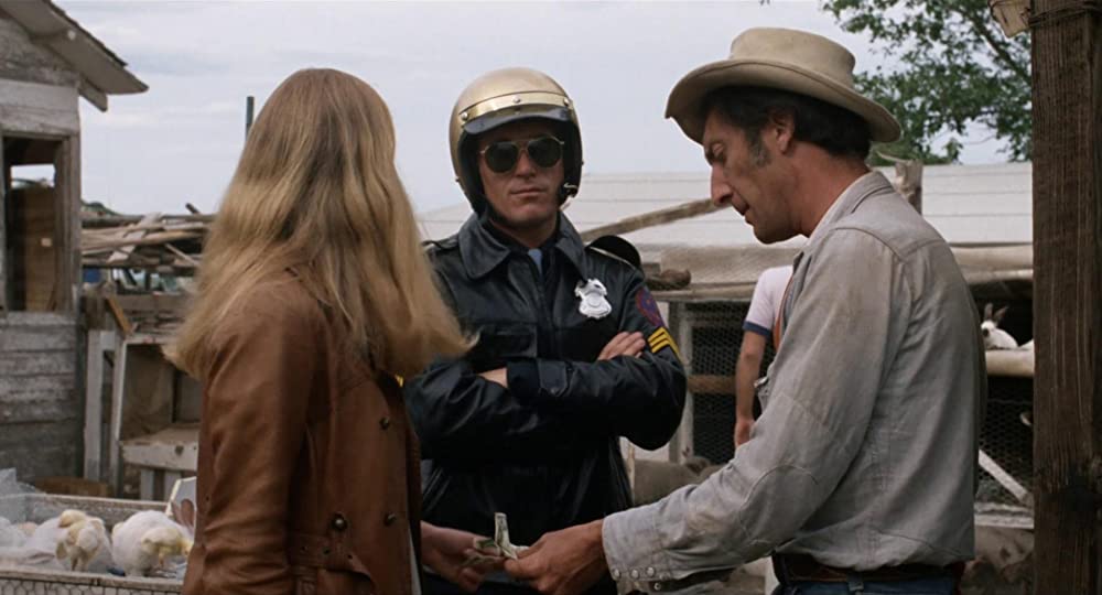 雨のなかの女の画像