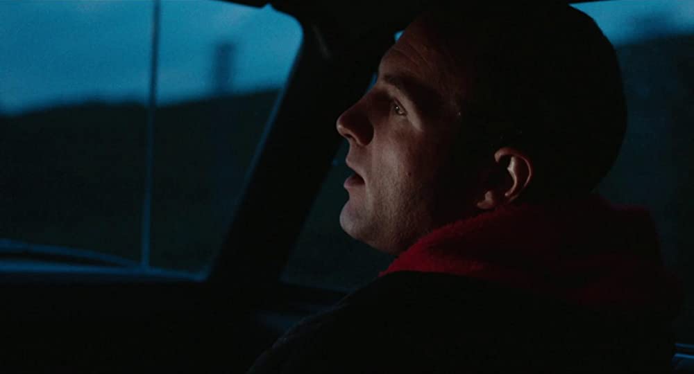 雨のなかの女の画像