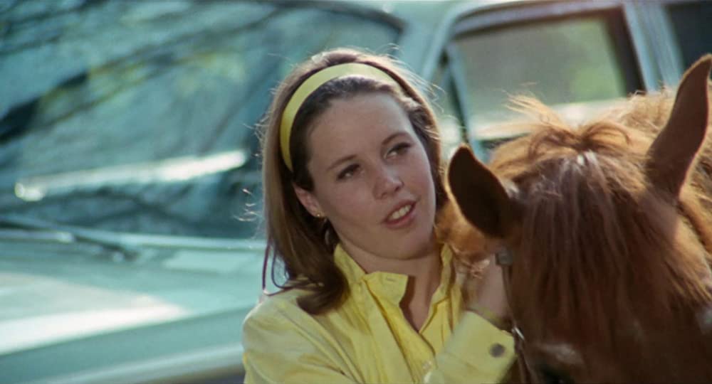 雨のなかの女の画像