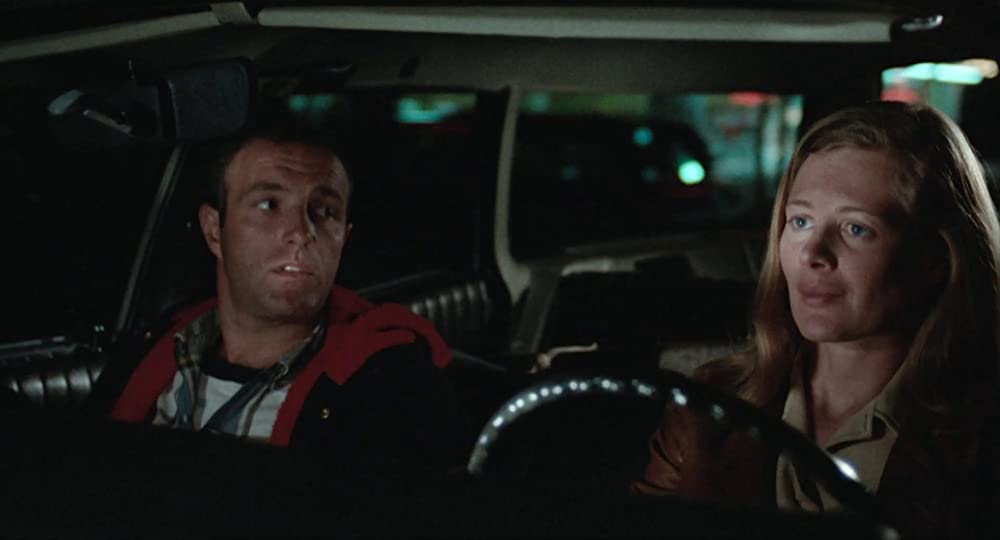 雨のなかの女の画像